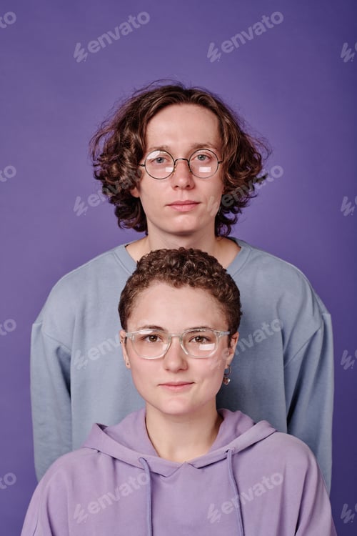 Preview: Two teenagers wearing eyeglasses for sight