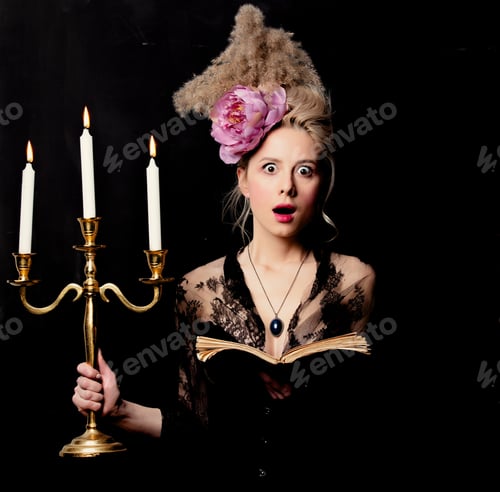 Preview: Beautiful blonde countess with a book and candlestick