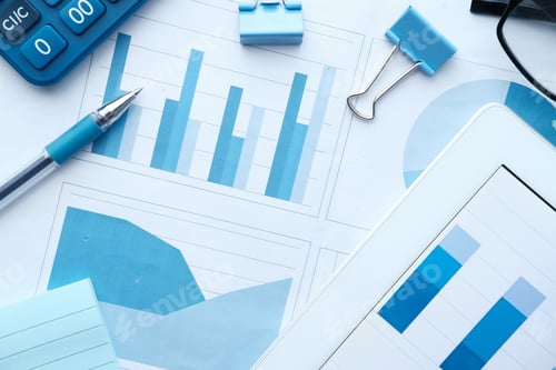 Preview: financial graph, calculator and notepad on table