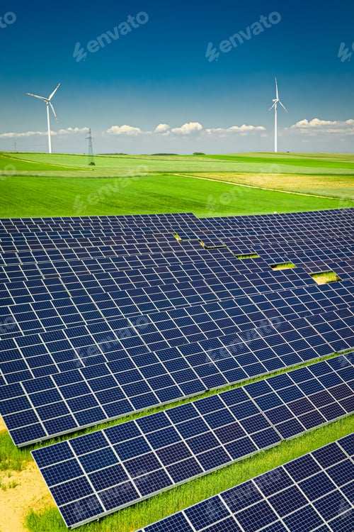 Stunning view of solar panels on green field, aerial view