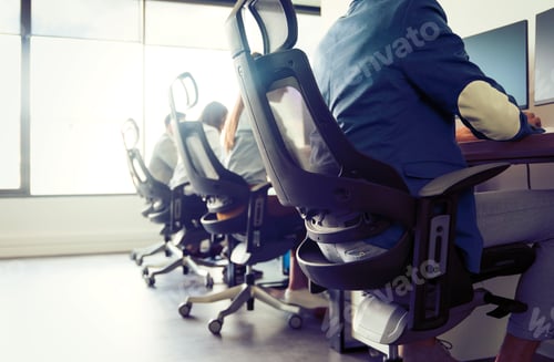 Preview: Programmers cooperating at IT company developing apps