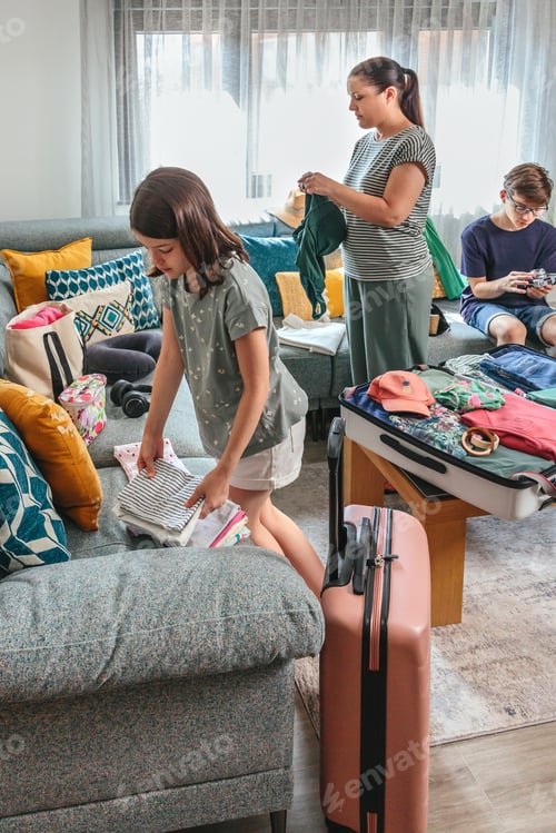 Preview: Family packing suitcases and bags for summer vacation in living room