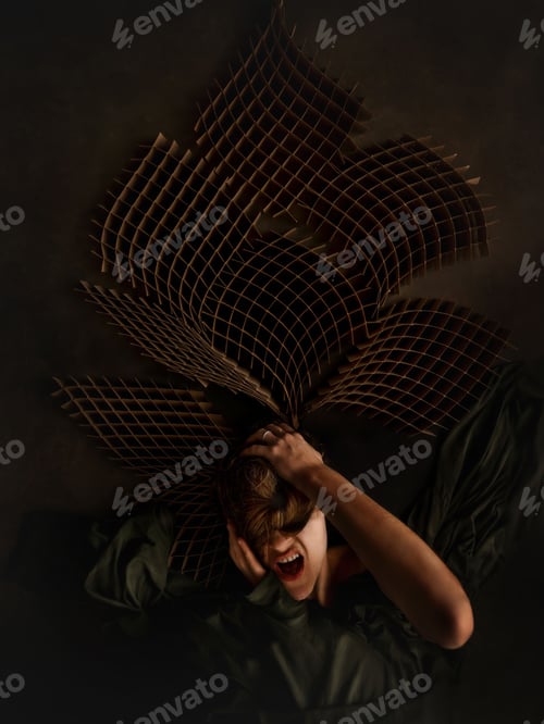 Preview: Portrait of a dramatic miserable woman holding her head and screaming in agony