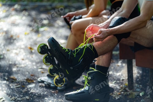 Preview: Couple prepares for an outdoor rollerblading adventure, putting on their rollerblades