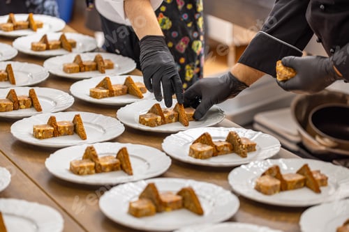 Preview: Chefs are arranging meat and toast bread pieces