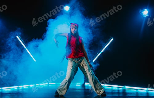 Preview: Hip hop dancer dancing in a cool studio with neon lights.