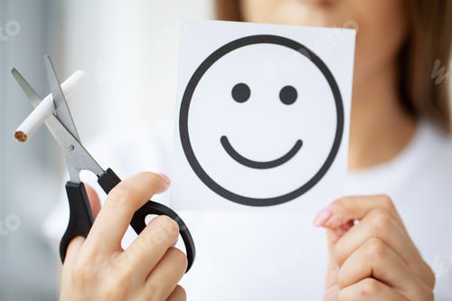 Preview: Stop smoking, close up of woman cuts a cigarette with scissors
