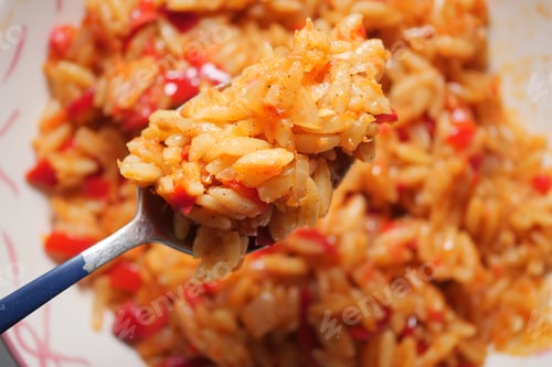 Preview: Savory Rice With Vegetables On Spoon. Fresh, Warm Home-Cooked Meal Close-Up