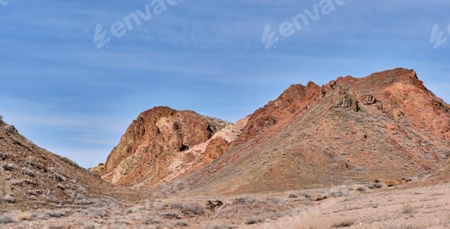 Preview: Colored sandy soil of hills over background of blue sky in Charyn Canyon National Park in Kazakhstan