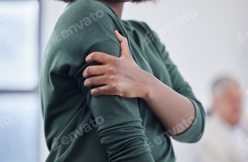 Preview: Shot of an unrecognisable businesswoman experiencing tension in a modern office