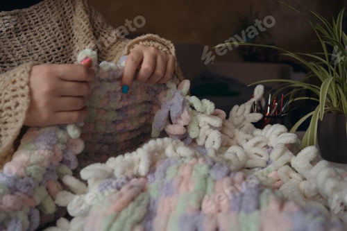 Preview: Knitting by fingers concept