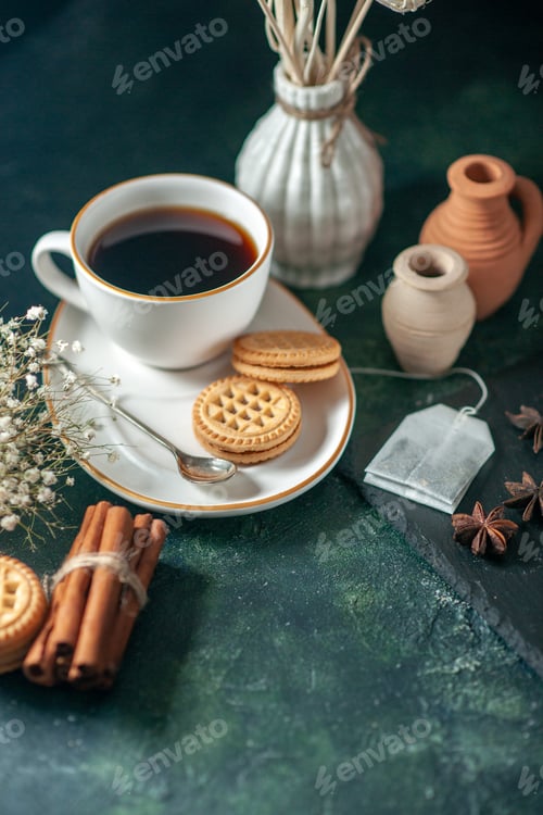 Preview: front view cup of tea with sweet biscuits on dark background bread drink ceremony breakfast morning
