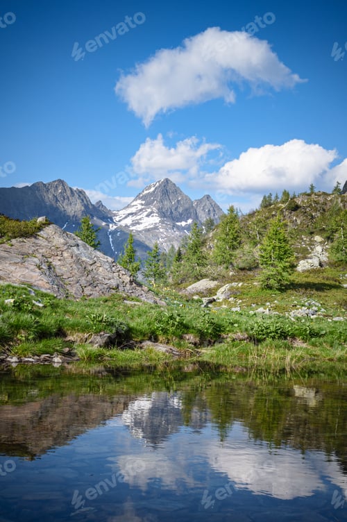 Preview: Alpine landscape of the Brembana Valley with small lake and Pizzo del Diavolo