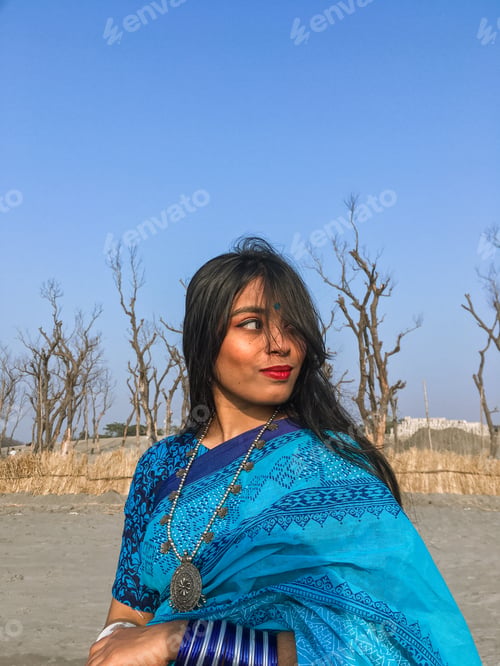 Preview: A beautiful woman in Saree