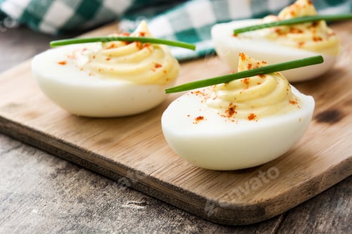 Preview: Gourmet deviled eggs garnished with chives