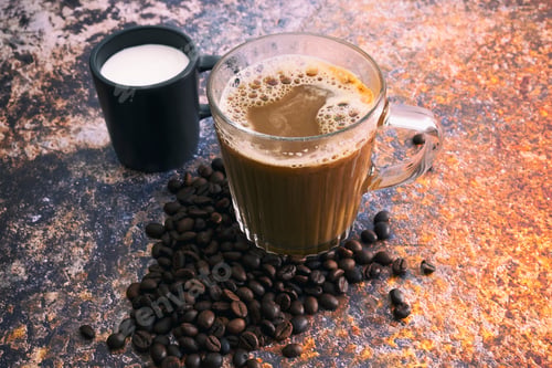 Preview: Hot Coffee With Milk On The Metal Table Top