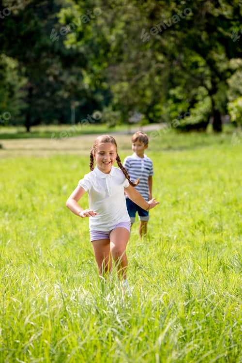 Preview: Happy siblings playing in the park and spending happy time together