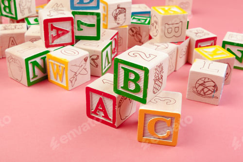 Preview: Letters background. Wooden cubes with letters with copy space