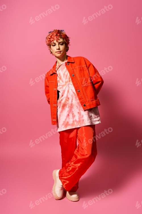 Preview: Vibrant Youth in Orange Jacket and Red Pants