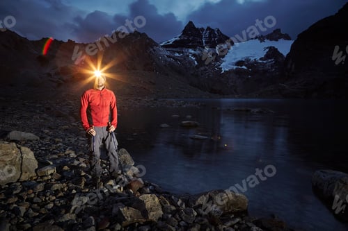 Preview: Hiker with headlamp standing at Lago de los Tres, Los Glaciares National Park, Patagonia, Argentina