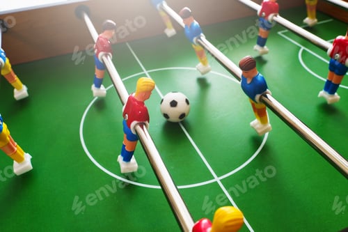 Preview: Close-up view of a table football game in progress