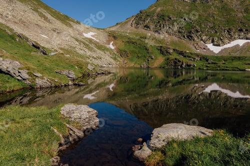 Preview: over the Fagaras Mountains, Romania. in view of the capra lake, outdoors