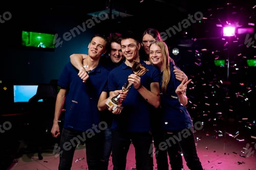 Preview: Happy team of gamers winning Cup