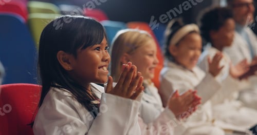 Preview: Children, applause and science show with smile, diversity and watching with lab coat and school. Ed