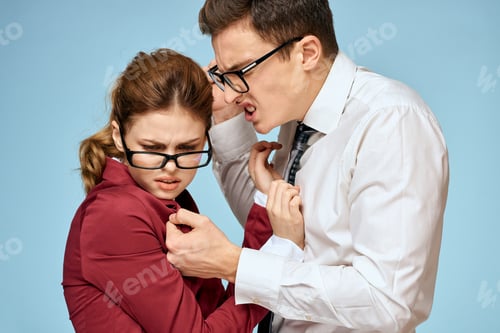 Preview: Business young couple officials office team office blue background