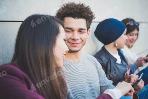 Preview: Multiracial group young people using smartphone