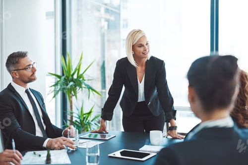Preview: Cropped shot of an attractive young businesswoman giving a presentation in the boardroom