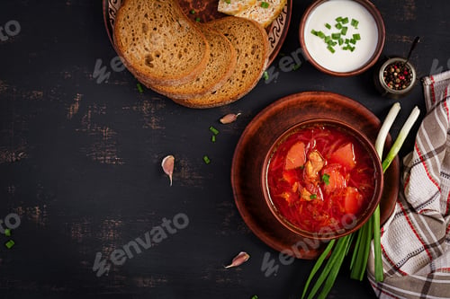 Preview: Traditional Ukrainian Russian borscht or red soup on the bowl. Top view