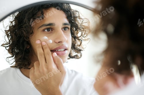 Preview: Man Applying Cream