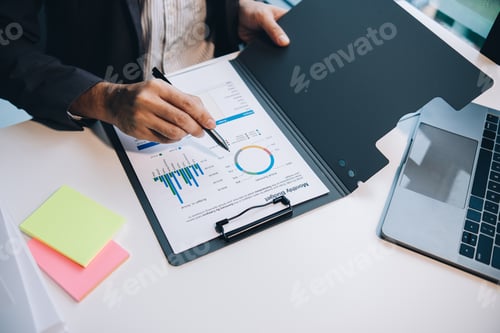 Preview: Businessman accountant working audit and calculating expense financial annual financial report