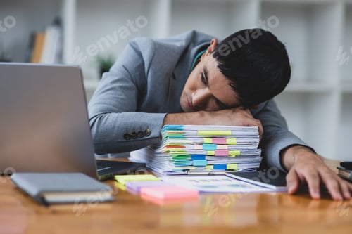 Preview: Businessman stressed from overwork and missed deadlines.
