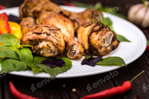 Preview: Roasted chicken quarter legs on rustic background