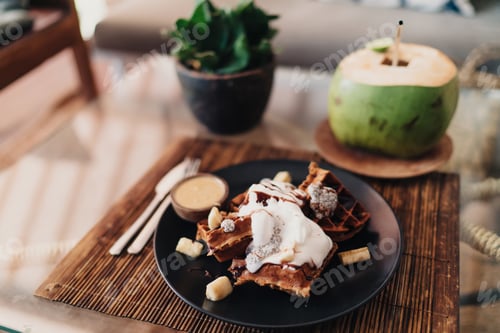 Preview: Tasty chocolate dessert with waffle served on bamboo mat