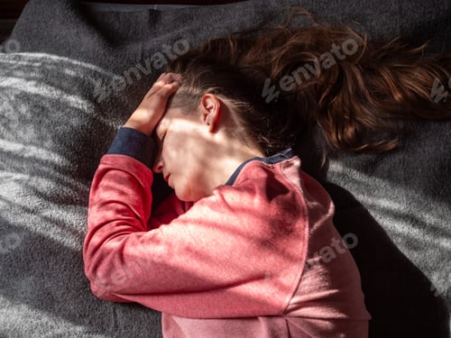 Vista previa: Stressed tired woman eyes closed suffers from headache Mental health Psychology Traumatic experience
