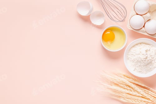 Preview: Ingredients for baking on light pink background.