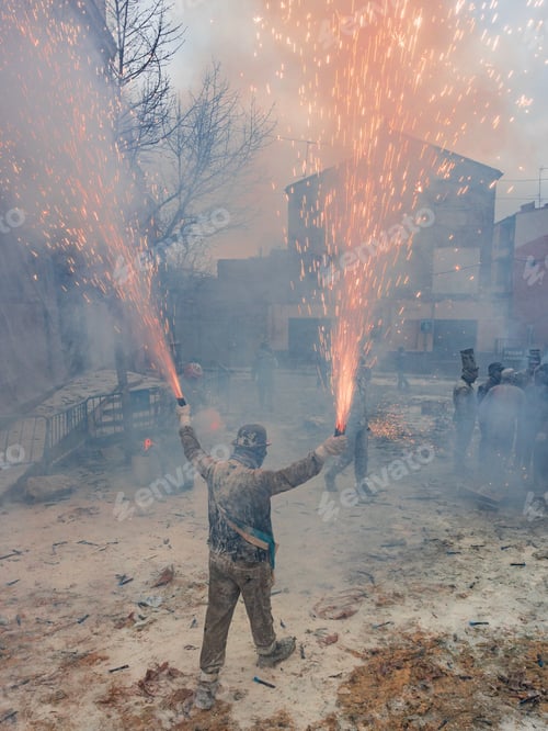 Preview: Ibi, Spain - December, 28 2018: People celebrating victory in flour and eggs battle