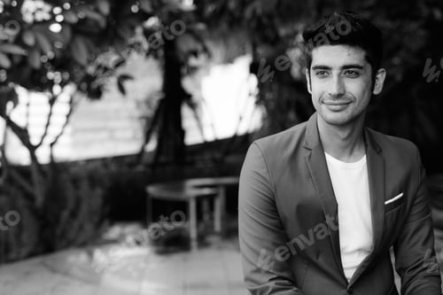 Preview: Young handsome Persian businessman exploring the city of Bangkok, Thailand