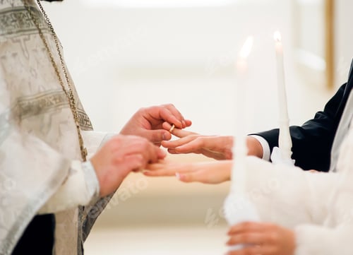 Preview: The priest puts on the ring at the wedding ceremony in the church