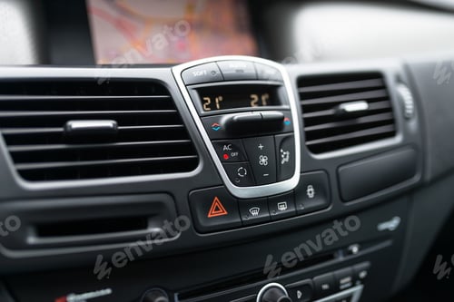 Preview: Car dashboard interior of modern car. Black cockpit with button and icon for air conditioner option,