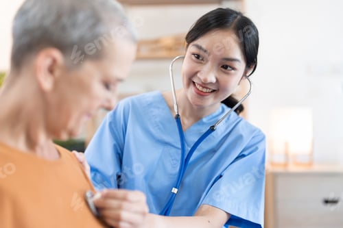 Vista previa: Smiling Healthcare Professional Visiting Senior at Home, Providing Medical Care and Support