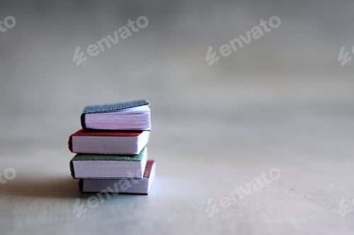 Preview: Selective focus image stack of books on concrete floor