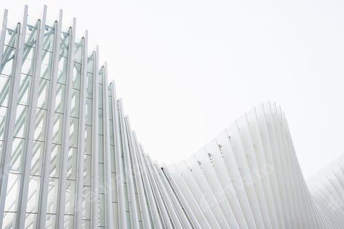 Preview: Horizontal shot abstract buildings with white metallic ribs and glass windows