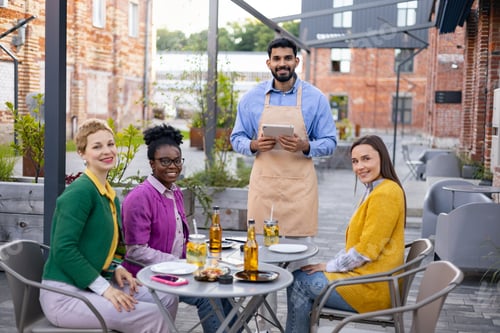 Preview: Friends Dining at an Outdoor Cafe