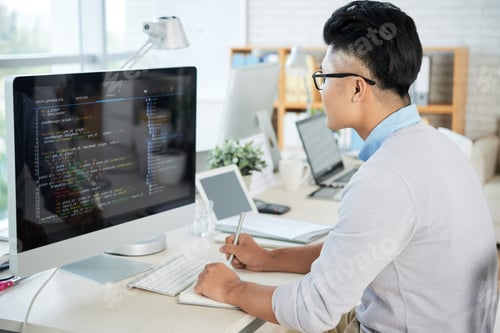 Preview: Asian designer working in office