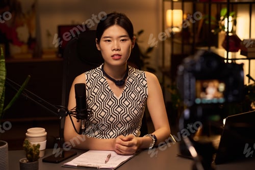 Preview: Portrait of Woman Conducting Online Webinar