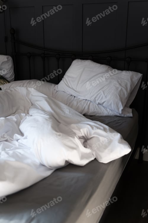 Preview: Soft pillows and duvet on comfortable bed